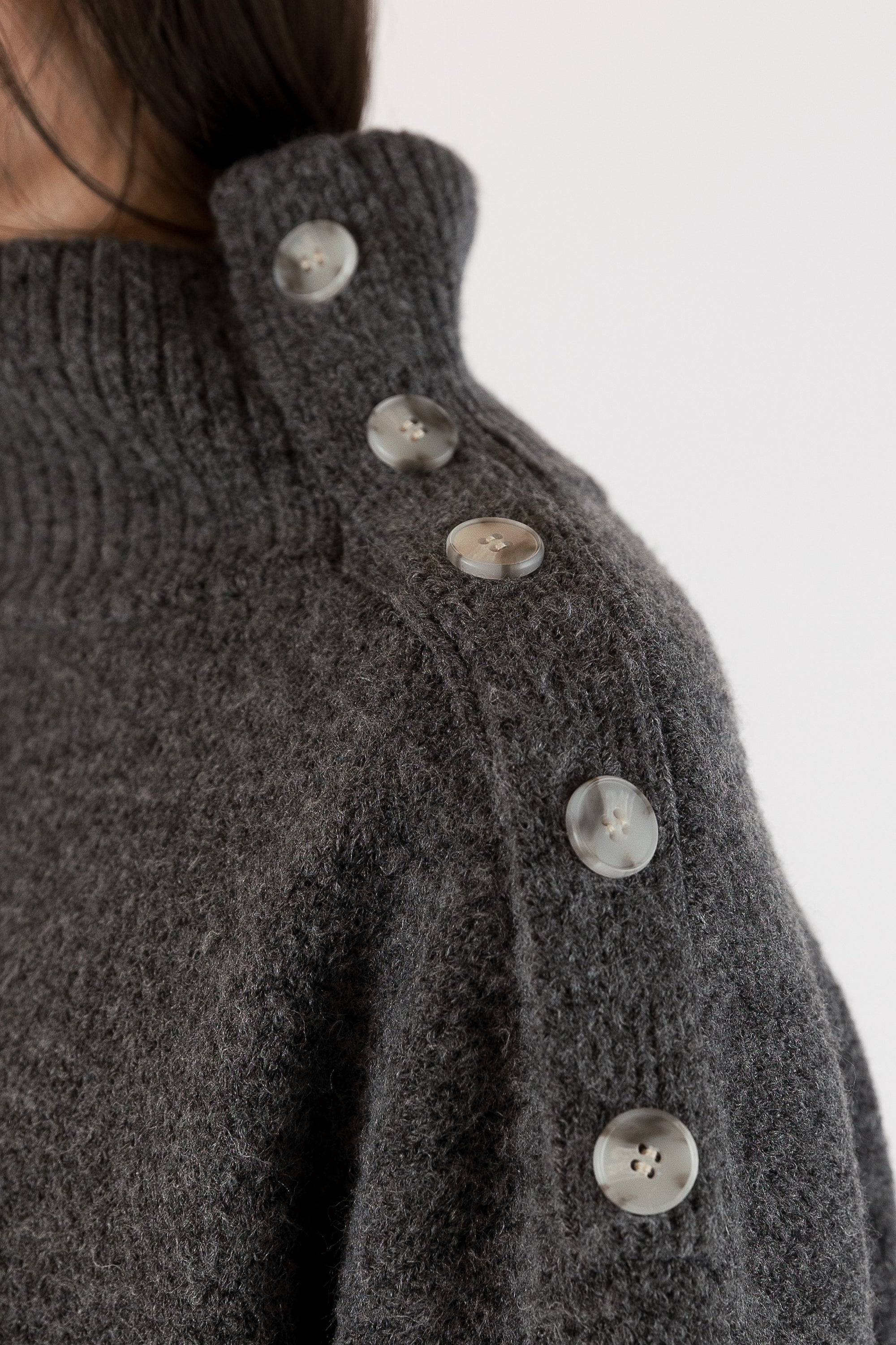 Mockneck Sweater With Shoulder Button Detail by Yates & Co